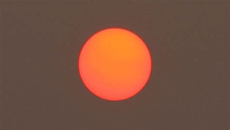 Meteorologist Explains Why The Sun Looks Particularly Red Right Now