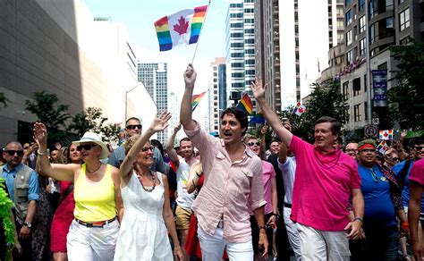 justin trudeau becomes first canadian pm to march in toronto s pride parade photos news