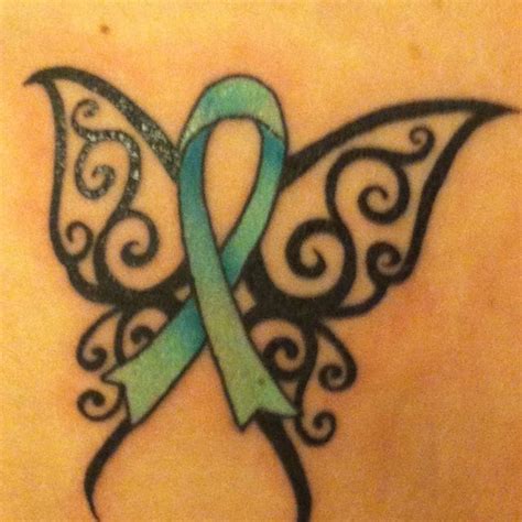 These ribbon tattoos that are worn by cancer patients and people who survived the disease as well as the any who are associated with this disease definitely looks good. Ovarian/cervical cancer ribbon | Tattoos | Pinterest