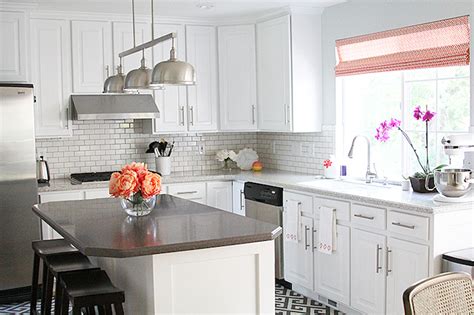 Bring out a more modern energy inside your kitchen with a splash of new countertops around the space. Kitchen with Corian Countertops - Transitional - Kitchen