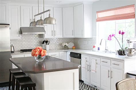 Countertop cabinets or cabinets that sit on the kitchen counter are something i've been noticing a lot lately. Kitchen with Corian Countertops - Transitional - Kitchen