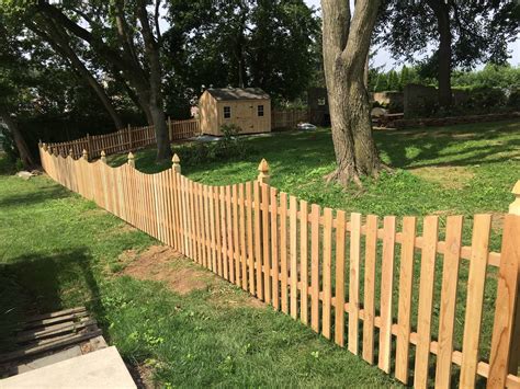 Red Cedar Concave Picket Fence With French Gothic Posts Smucker Fencing