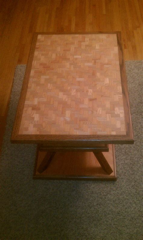 Oregon black walnut top with old growth redwood base and cast bronze bowtie. Custom Made Coffee Table | EJK Custom Remodeling