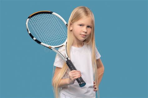 girl holding tennis racket on her shoulder stock image image of standing posture 220925769