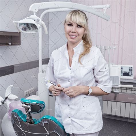 Portrait Of Blonde Dentist High Quality Health Stock Photos