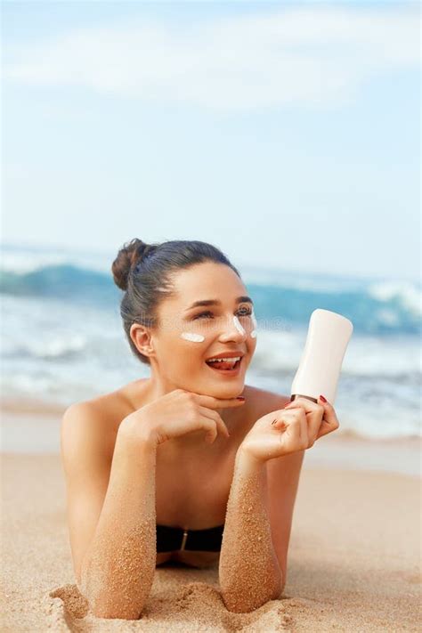 Beauty Woman Skin Care Sunscreen Holding Bottles In Her Hands Suntan Girl Applying Sun Cream On
