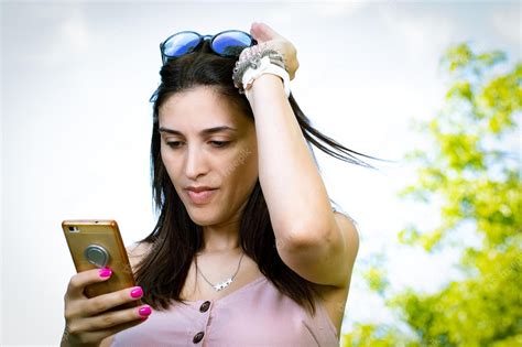 Premium Photo Young Girl With A Trendy Look Taking A Selfie To Post On Social Media While