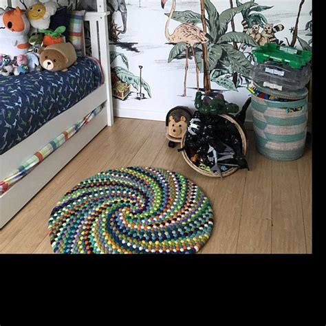 Discount area rugs on sale now. Felt ball rug rainbow Colorful pom pom large rug Spiral ...