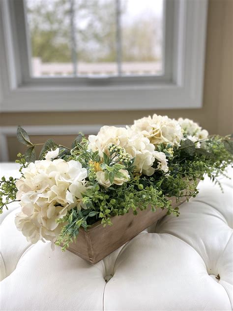 Made in a wood box giving a traditional farmhouse/rustic look. Farmhouse Hydrangea Centerpiece with Greenery Silk Flower ...