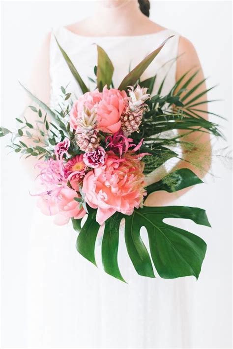 Tropical wedding bouquet can have many characteristics from bright and bold colors to exotic flowers, mix and take a look at these stunning tropical wedding bouquets and choose your favorite one Pink pineapple bouquet | Tropical wedding flowers ...