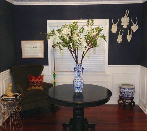 Be sure and paint a poster board and tape it up just to make sure that you like the color in the lighting. Entryway: Benjamin Moore Hale Navy, antlers, & blue and ...