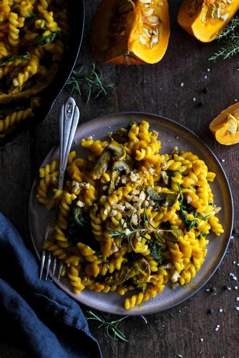 Turn down to a low heat, slice your mushrooms & gently fry with your fresh rosemary. Vegan Pumpkin Pasta with Spinach and Mushrooms • Happy Kitchen