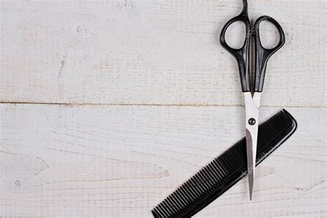 Scissors And Comb On White Rustic Wooden Background Hairdresser Salon