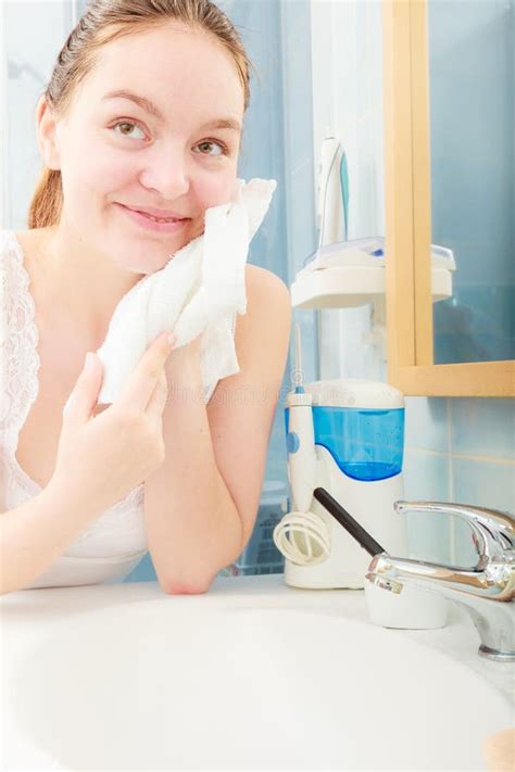 Woman Washing Her Face With Clean Water In Bathroom Stock Image Image