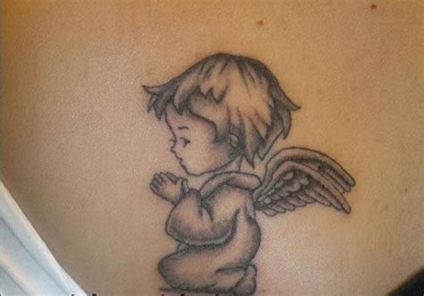 Top 7 Beautiful Baby Tattoo Designs Baby Angel Tattoo Baby Tattoo