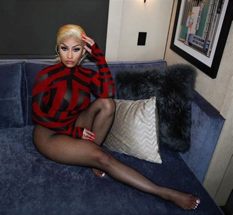 Nicki Minaj Flaunts Her Massive Behind In Sexy Bodysuit Photos