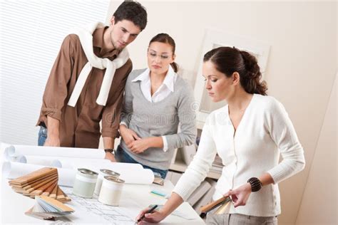 Female Interior Designer With Two Clients Stock Photo Image 11941308
