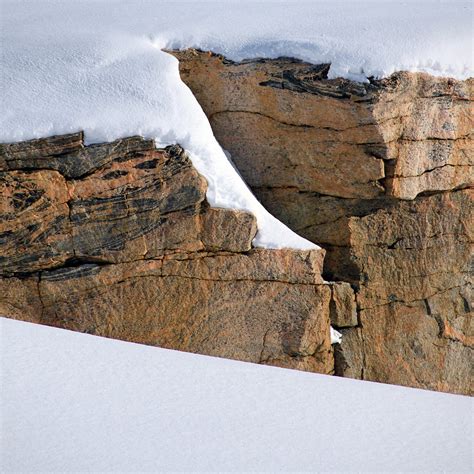 Snowy Cliff Snowcovered Cliff In Kap Tobin East Greenland