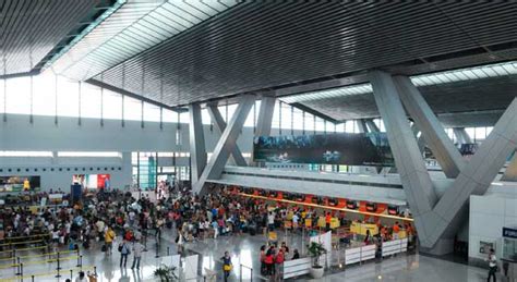 Located 8 km (5.0 mi) south of manila in the cities of pasay and parañaque. Manila Ninoy Aquino International Airport (MNL)