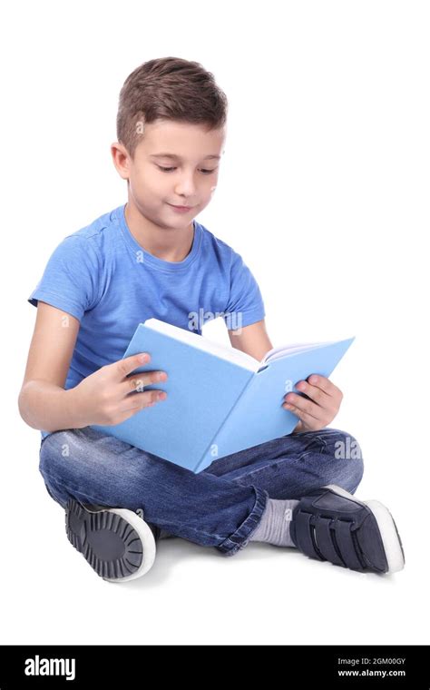 Cute Little Boy Reading Book On White Background Stock Photo Alamy