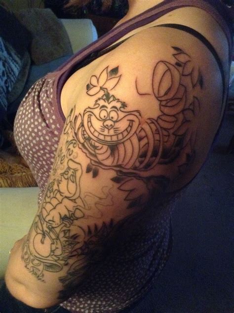 Just got the Cheshire Cat added to my Alice in Wonderland Tattoo Sleeve