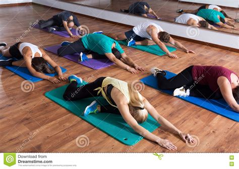 Adults Having Yoga Class In Sport Club Stock Image Image Of Class