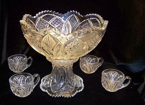 Punch bowls and cups are not only tough but also come in beautiful designs to add more glamour to your kitchen shelves. Antique Cambridge Semitar EAPG Punch Bowl with Cups ...