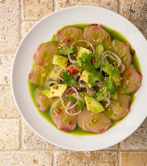Aguachile, literally meaning chile water, is traditionally made with chiles, cilantro, onion, lime, and, yeah, water. Mexican Aguachile Recipe - Mexican Yellowtail Sashimi ...