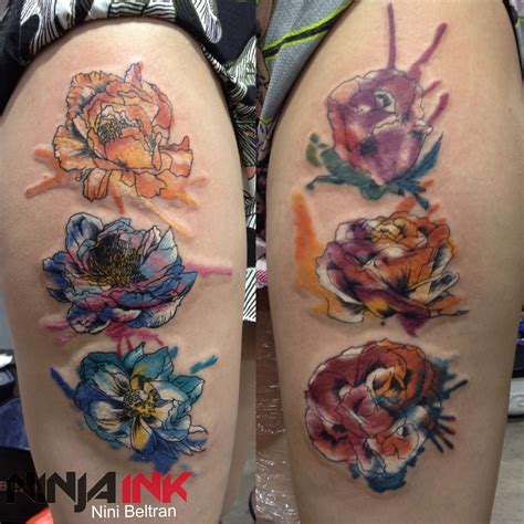 150 colorful watercolor tattoo ideas & design for women. Watercolor flowers tattoo by Nini Beltran Ninja Ink Tattoo ...