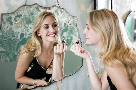 Woman Applying Lipstick In Mirror Photograph By Science Photo Library Pixels
