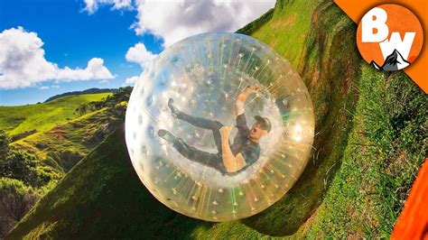 Rolling Off A Mountain In An Inflatable Ball Youtube