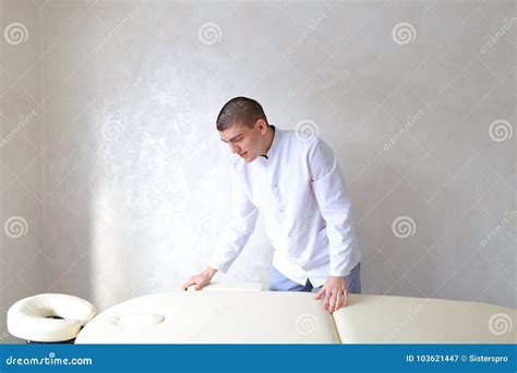 professional male massage therapist preparing to receive patient stock image image of interior