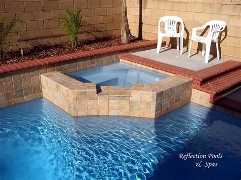 Cambridge pavingstones bullnose and coping stones. 12" raised spa with bullnose brick coping & steps | Paul ...