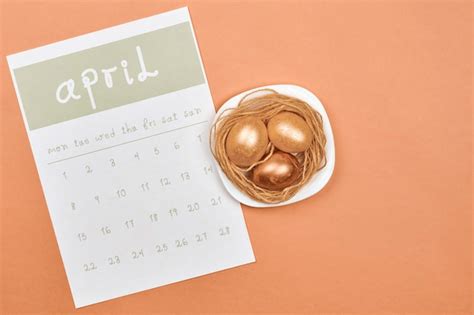 Premium Photo Decorated Easter Eggs With April Calendar Bright April