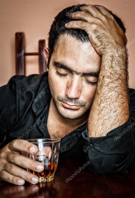 Lonely And Desperate Drunk Hispanic Man Stock Photo By ©kmiragaya 24868001