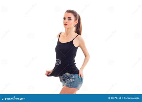 Beautiful Slim Girl With Red Lipstick In A T Shirt And Shorts Looking