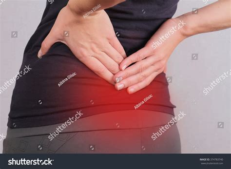 Oct 21, 2020 · how to: Back Pain. Athletic Fitness Woman Rubbing The Muscles Of Her Lower Back. Sports Exercising ...
