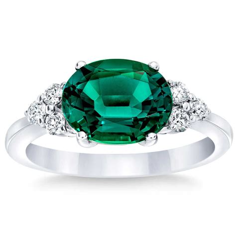 Oval Cut Lab Created Emerald And 023ctw Diamond Ring 14ct