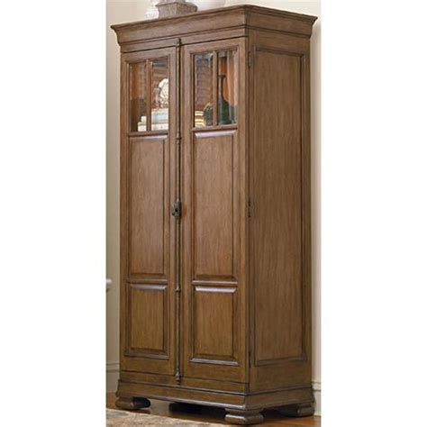 The double doors are decorated with eight unique designs created with metal inlay. 071160 Universal Furniture New Lou Bedroom Armoire Tall ...
