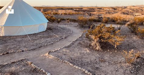 A White Tent In The Middle Of A Desert Photo Free Glamping Image On