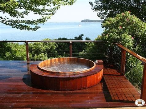 Cedar hot tub 5 x 4 wood tub | wood tub, japanese soaking. Check out that view!! Unique deck design using natural ...