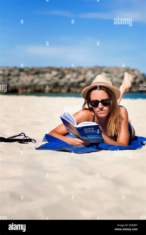 Girl Reading On The Beach Cottesloe Beach Western Australia Stock Photo Alamy