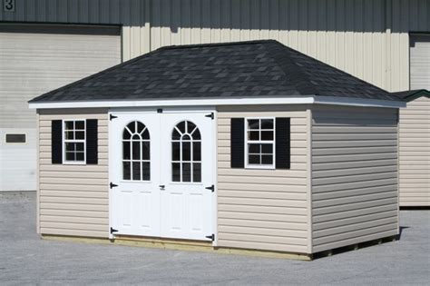 The result is an asymmetrical roof and a home with much more space than one with a similarly sized open gable roof. Stoltzfus storage sheds ~ Indr