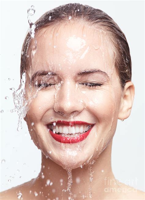 Smiling Woman Face With Dripping Water Photograph By Maxim Images