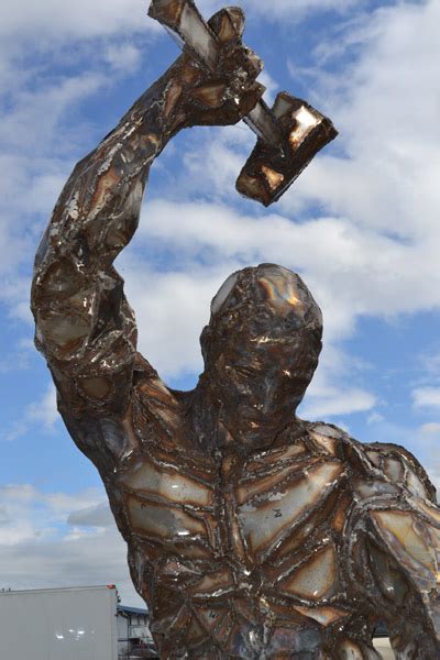 You can pick the metal wall decorations which have design of trees or leaves. Metal Man sculpture - Sequim Daily Photo