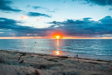 100 Free Photos Reddish Sunset In Peaceful Beach Lagoon