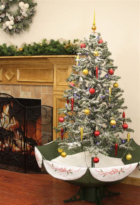 55 Pre Lit Medium Musical Snowing Artificial Christmas Tree With