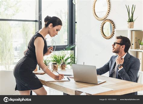 A girl's memory of being paddled at school. Seductive secretery leaning over desk — Stock Photo ...