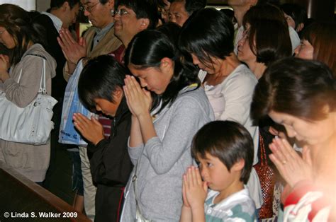 Prayers At Asakusa Temple Tokyo Japan