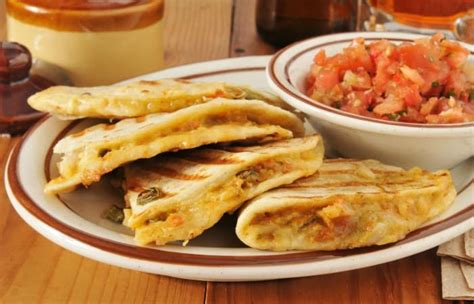 Also known as 'chicken and cheese quesadilla.' the simplicity yet deliciousness of this recipe is what makes it so popular with so many people around the world, just like its vegetarian counterparts. Easy Chicken Quesadillas Recipe - Nerdy Mamma